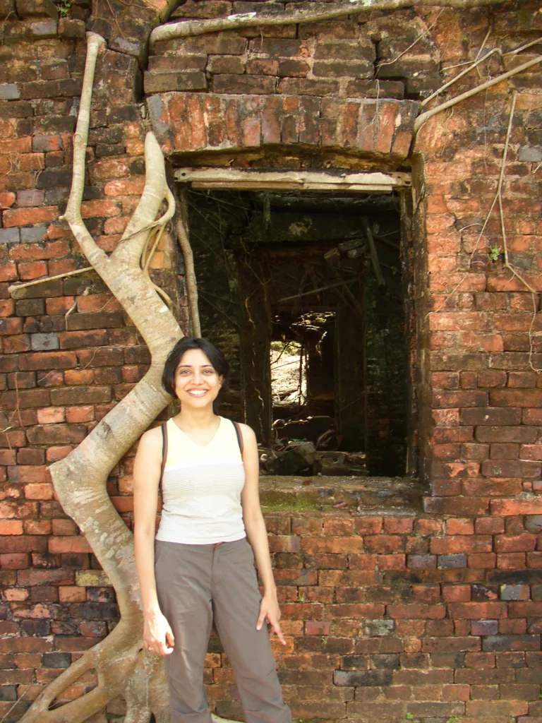 Shweta in front of a door in Havelock Island, India