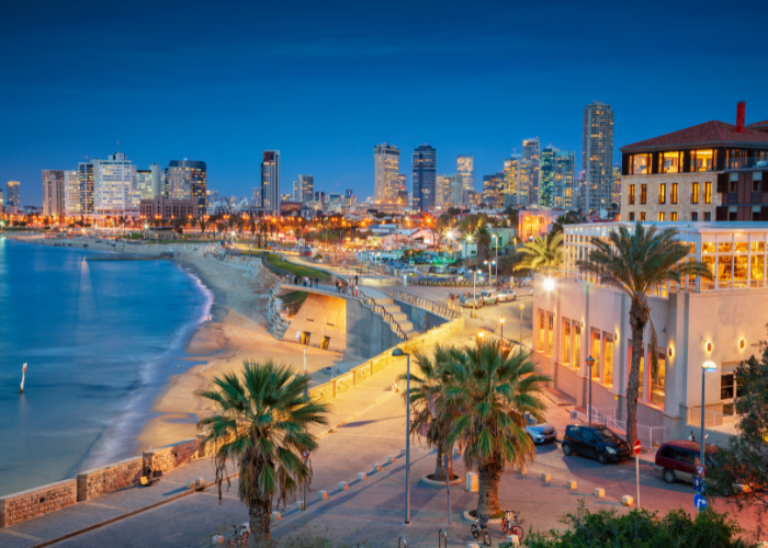 13 Best Urban Beaches in the World: Top City Beaches Revealed 13 the shoreline of tel aviv, Israel during nighttime