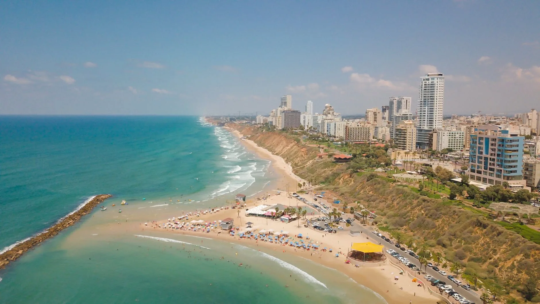 13 Best Urban Beaches in the World: Top City Beaches Revealed 14 aerial view of tel aviv coastline israel