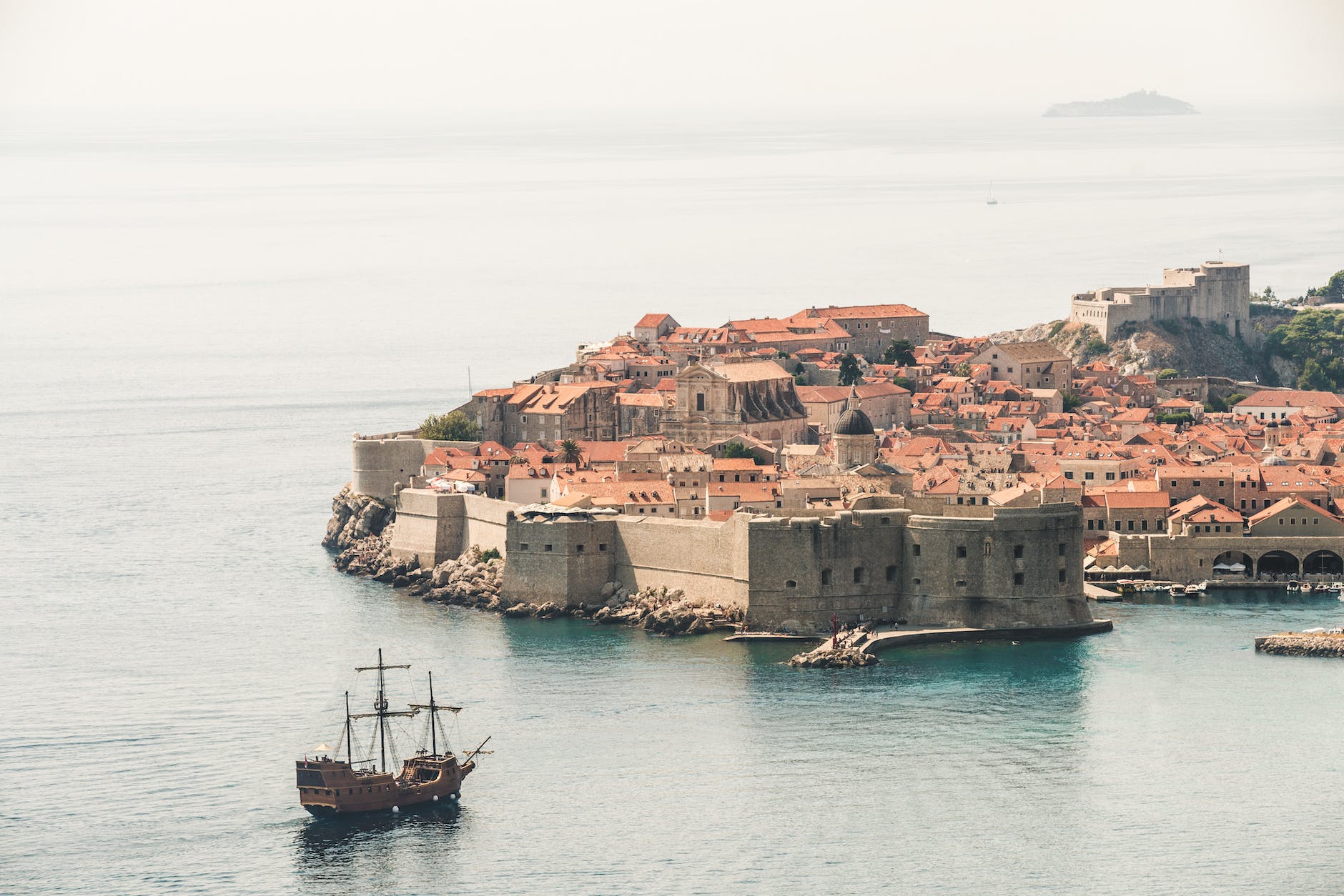 13 Best Urban Beaches in the World: Top City Beaches Revealed 20 brown sailing ship near building