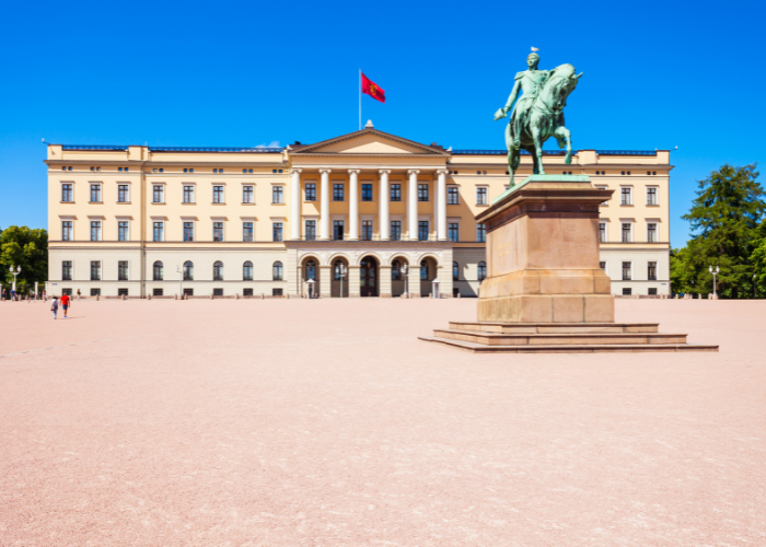 The Royal House in Oslo and the statue in front of it