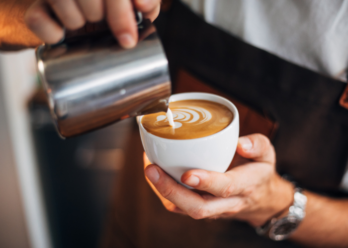 29 Things Not to Do in Italy: Avoid These Mistakes 23 barista serving a caffe latte