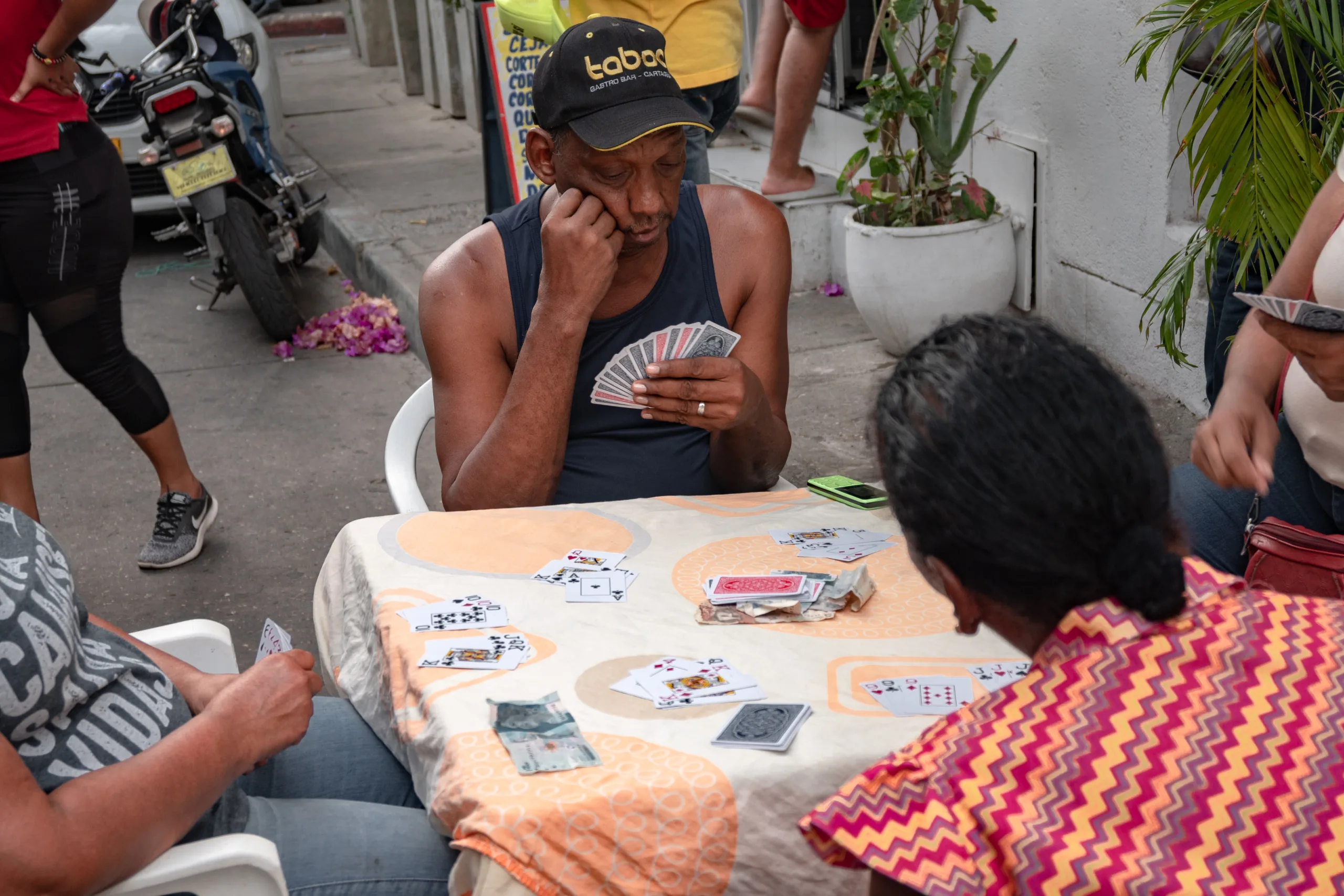 People playing with cards in Medellin