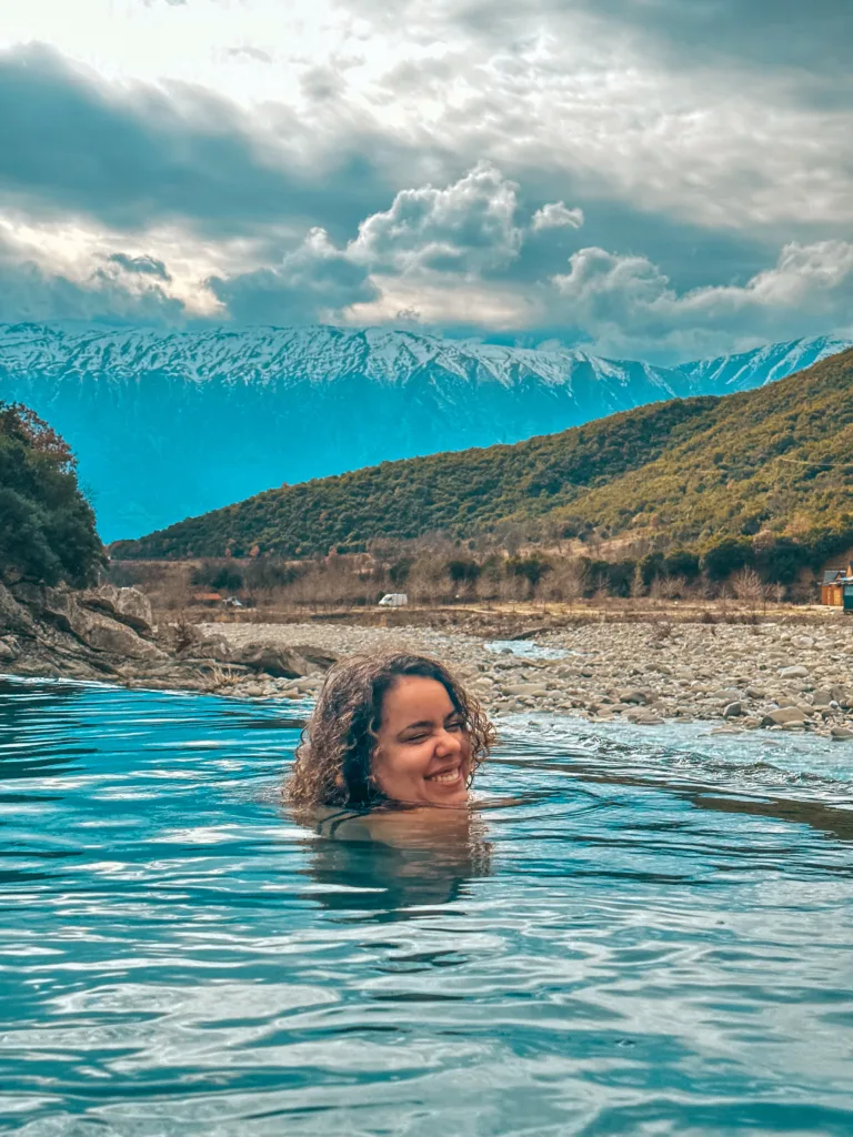 Brenda experiencing Benjes hot springs in Albania