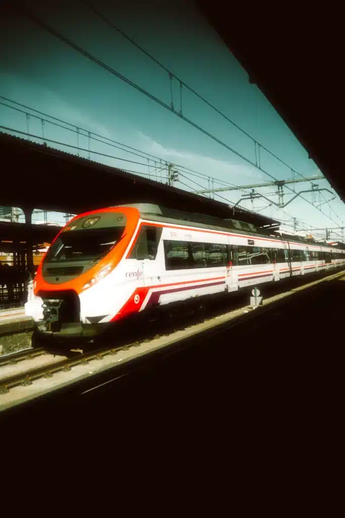 Spain Solo Female Travel Comprehensive Guide 2026 4 red and white train on railway station in madrid spain