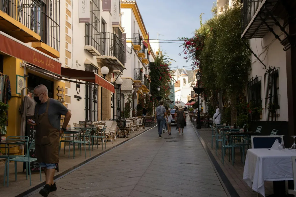 Best Ideas for Solo Trips in 2026 9 people walking on the street near buildings