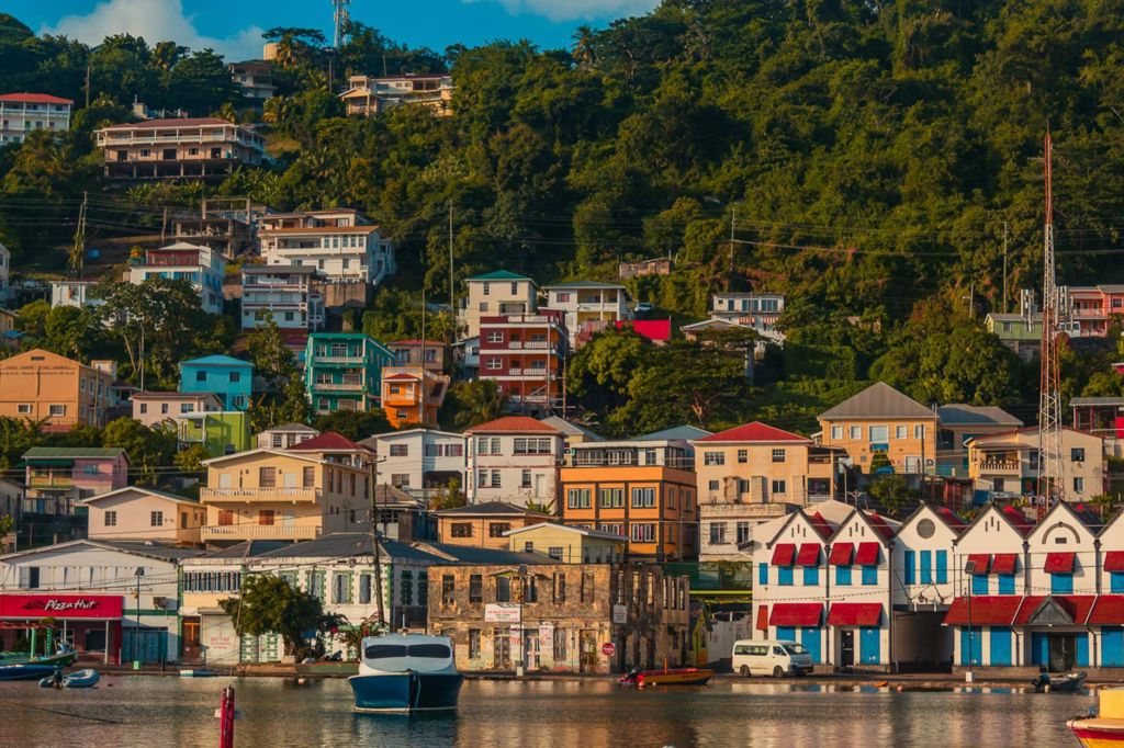 Best Caribbean Islands for Solo Female Travel in 2026 8 seaside buildings on a hillside in town of saint george