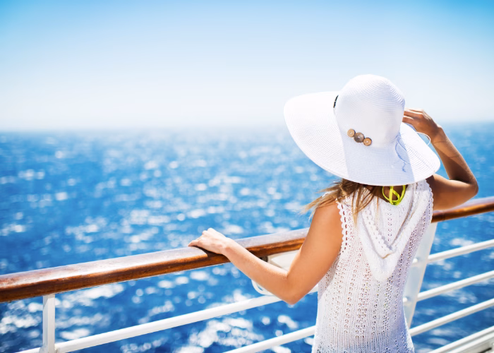 Sex Cruises for Singles: A Comprehensive Guide 2026 3 single girl watching the ocean from a cruise balcony