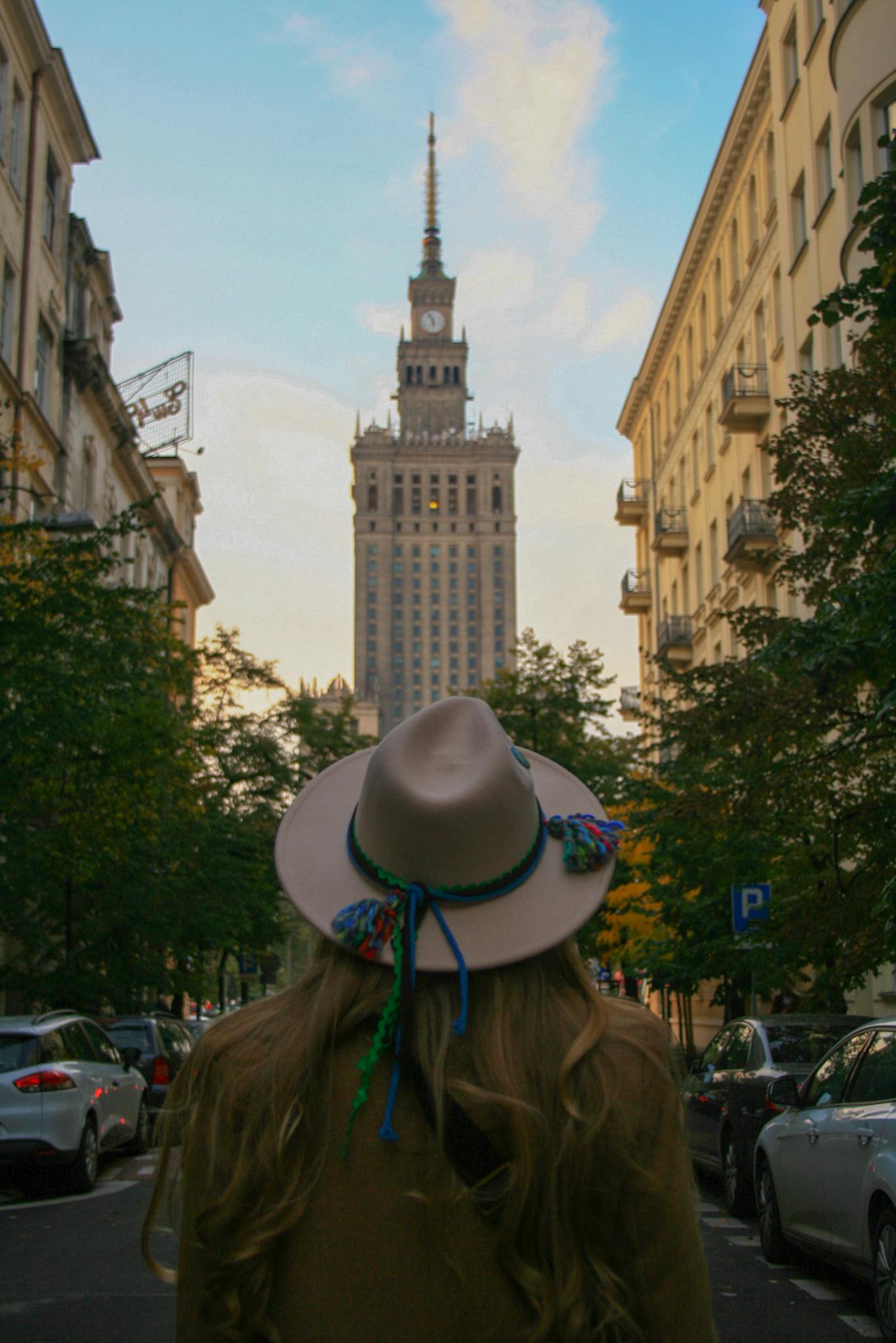 Resources 10 a woman in a colorful hat looks